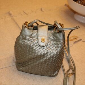 Chic Metallic Crossbody Bag 7 in x 4 inches w/gold accents. Darling shoulder bag
